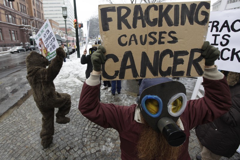 Fracking opponents protest before the Tom Corbett inauguration to become the 46th governor of Pennsylvania at the state capitol in Harrisburg, Pa., Tuesday, Jan. 18, 2011. CREDIT: AP PHOTO/MATT ROURKE