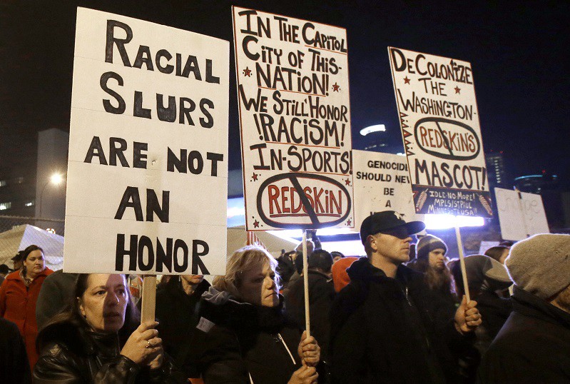 Native Americans protest the Washington football team’s name before a 2013 game in Minnesota. CREDIT: AP