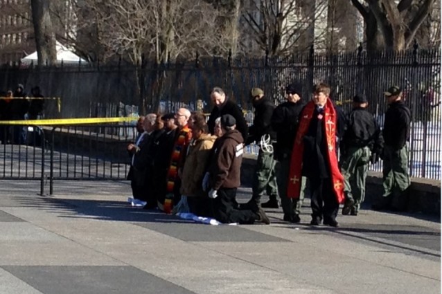A church leader gets arrested for protesting deportations in front of the White House. CREDIT: ThinkProgress/ Esther Y. Lee