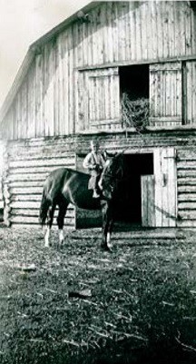 Joseph Labrecque’s first son Raymond, on his homestead, circa 1940. CREDIT: StopBaytex.ca