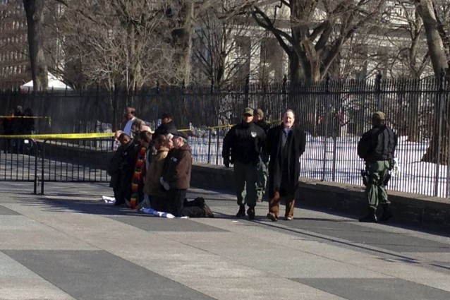 United Methodist Church’s Director of Civil and Human Rights Bill Mefford (right) was arrested for protesting deportations in front of the White House. CREDIT: ThinkProgress/ Esther Y. Lee
