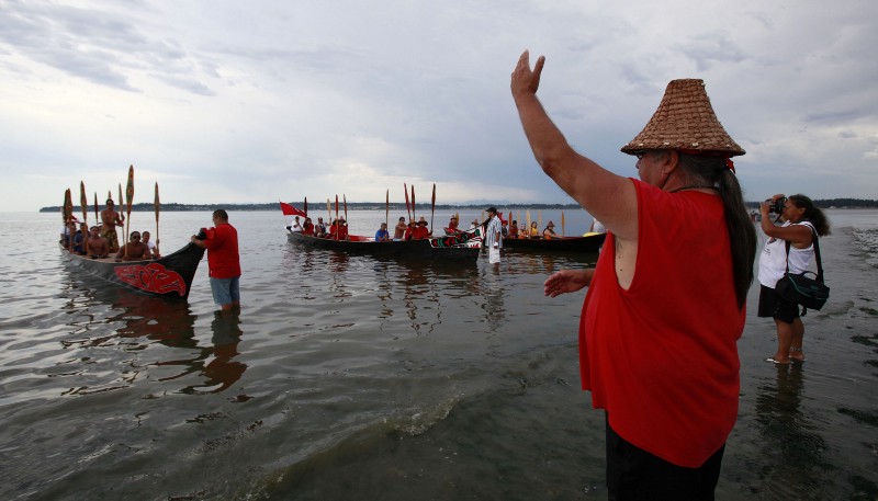 Ancestors of the paddlers, the Coast Salish Indians, had paddled the same waters to Washington state for hundreds of years, using canoes as spiritual vessels. In this 2009 photo, some of the canoes towed U.S. Geological Survey equipment to measure the health and quality of the water. CREDIT: AP PHOTO/ELAINE THOMPSON