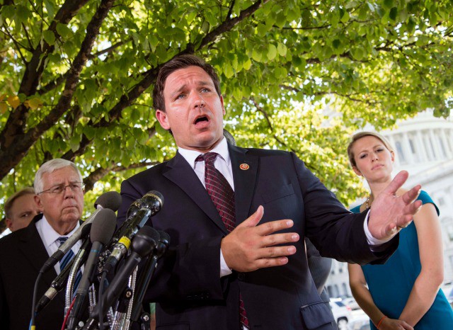 Rep. Ron DeSantis, (R-FL), center CREDIT: AP PHOTO/J. SCOTT APPLEWHITE