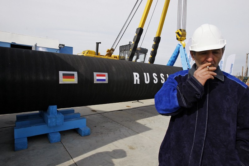 A Russian construction worker at the Nord Stream pipeline. CREDIT: AP PHOTO/DMITRY LOVETSKY, FILE