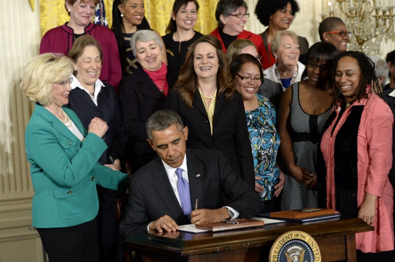 President Obama signs executive actions on equal pay CREDIT: AP PHOTO/SUSAN WALSH