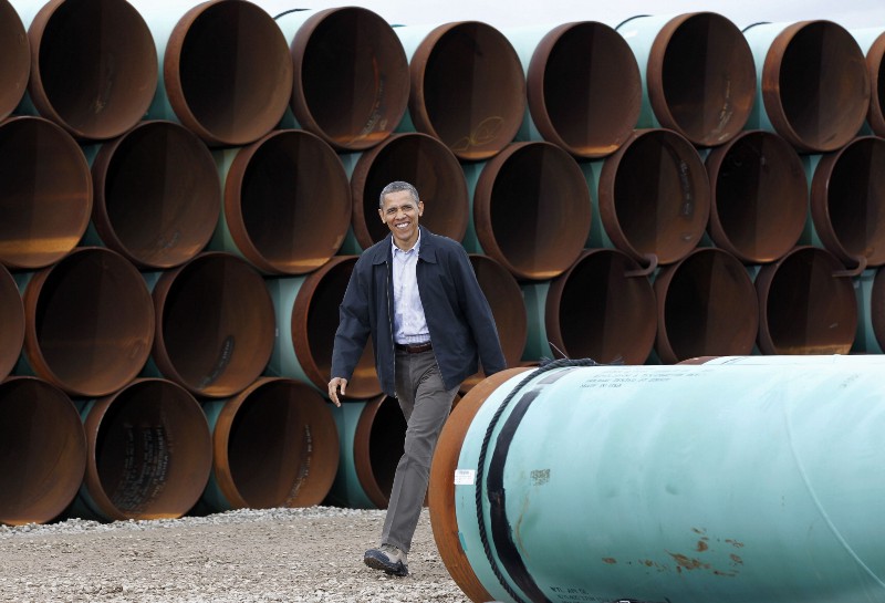 President Barack Obama arriving at the TransCanada Stillwater Pipe Yard in Cushing, Okla. TransCanada is the company vying for approval of its Keystone XL tar sands pipeline. CREDIT: AP PHOTO/PABLO MARTINEZ