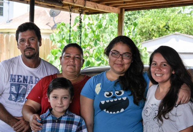 Roxana M. (right) and family CREDIT: Jack Jenkins