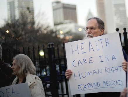 Bert Skellie, of Decatur, Georgia, protests for Medicaid expansion CREDIT: AP Photo/David Goldman