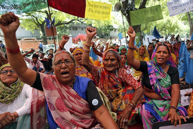 Activists protest plans to raise the height of the Sardar Sarovar dam in India. CREDIT: APĀ IMAGES