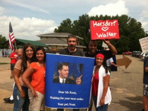 Jammi Juarez (in orange) and fellow IBEW Local 1245 members in Wisconsin in 2012 CREDIT: IBEW Local 1245