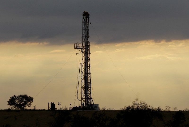 A drilling rig is seen near Kennedy, Texas, Wednesday, May 9, 2012. CREDIT: AP PHOTO/ERIC GAY