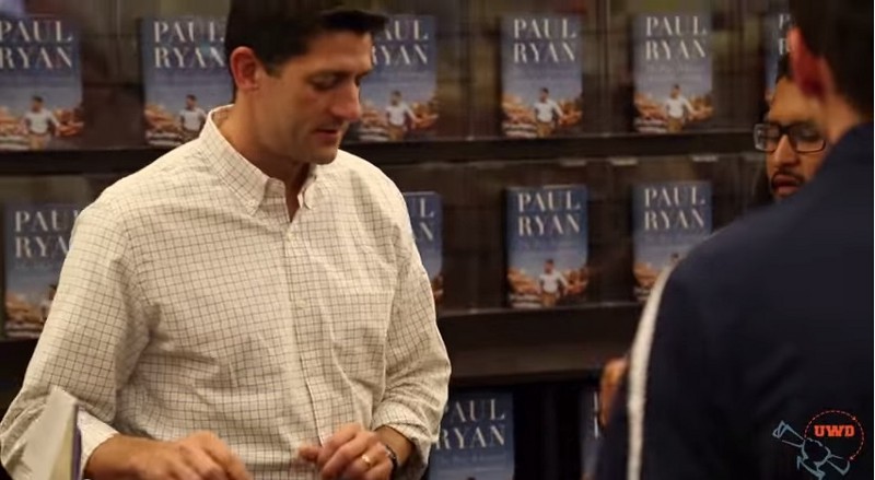 A DREAMer (right) confronts Rep. Paul Ryan at a book signing. CREDIT: SCREENGRAB