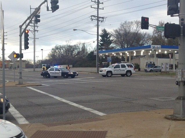 Beauty supply store that burned down. Cops block the street at W. Florissant CREDIT: ThinkProgress/ Carimah Townes/ Erica Hellerstein