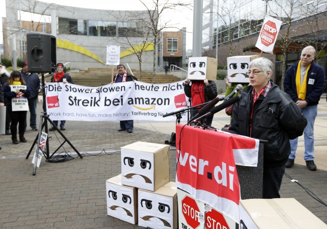 German Amazon workers protest over wages last year. CREDIT: AP IMAGES — TED WARREN