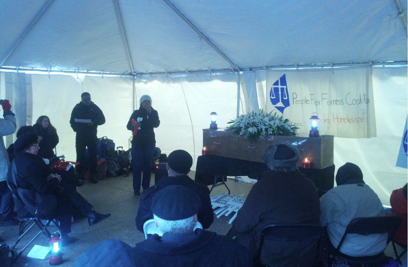 Activists and the homeless commemorate National Homeless People’s Memorial Day with a symbolic funeral for the dozens of people who died on the streets of D.C. in 2014. CREDIT: ALAN PYKE/THINKPROGRESS