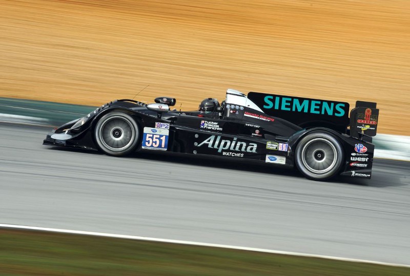 Scott Tucker, seen here driving one of his race cars in 2013, may soon face criminal charges over the payday lending empire that finances his lifestyle. CREDIT: AP