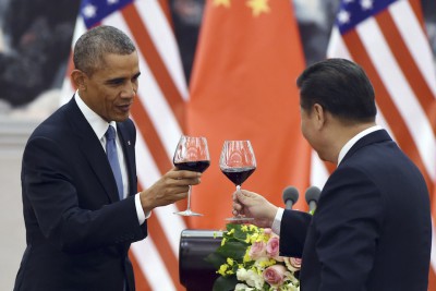 U.S. President Barack Obama (left) toasts with Chinese President Xi Jinping upon announcing the climate deal. CREDIT: AP Photo / Greg Baker