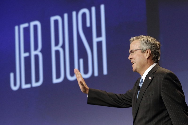 Jeb Bush speaks at the National Automobile Dealers Association convention in San Francisco. CREDIT: AP IMAGES