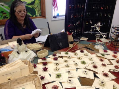 Janie Verret Luster creates jewelry using the scales of alligator gar fish. CREDIT: Alice Ollstein