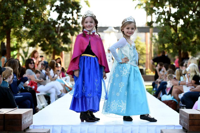 Models dressed up as (from left) Anna and Elsa from Disney’s “Frozen” at Disney Consumer Products’ VIP Halloween Fashion Show on Oct. 1, 2014 in Glendale, Calif. CREDIT: Jordan Strauss/Invision for Disney Consumer Products/AP Images