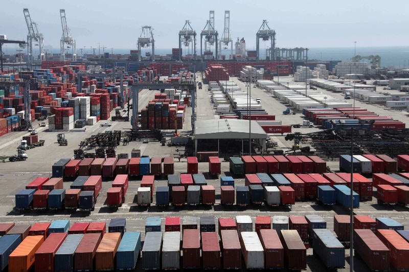 The Port of Long Beach, seen here in happier times in 2009, is one of 29 Pacific coast shipping ports embroiled in a long-running contract dispute between workers and managers. CREDIT: AP
