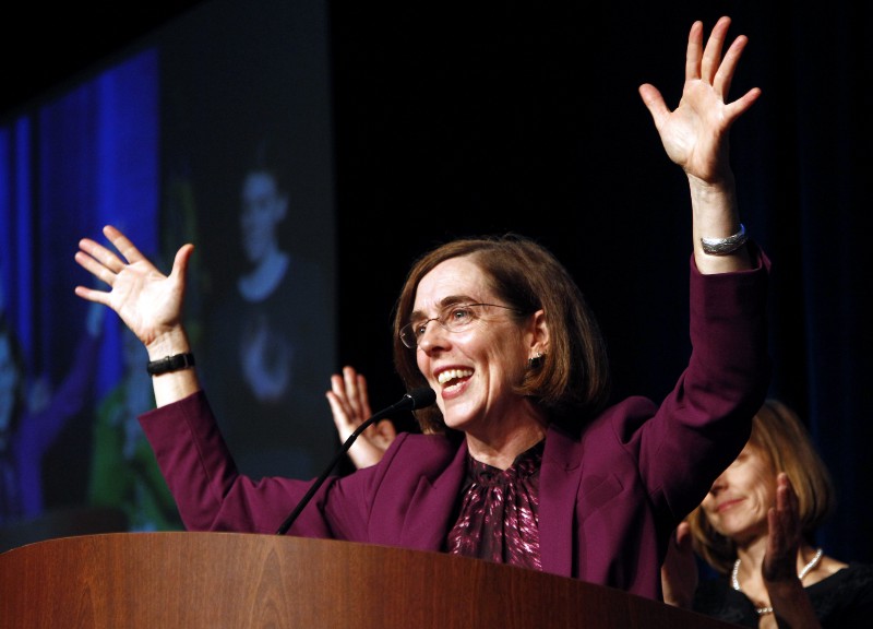 Oregon Secretary of State Kate Brown will be sworn in as governor next week. CREDIT: AP PHOTO/DON RYAN, FILE