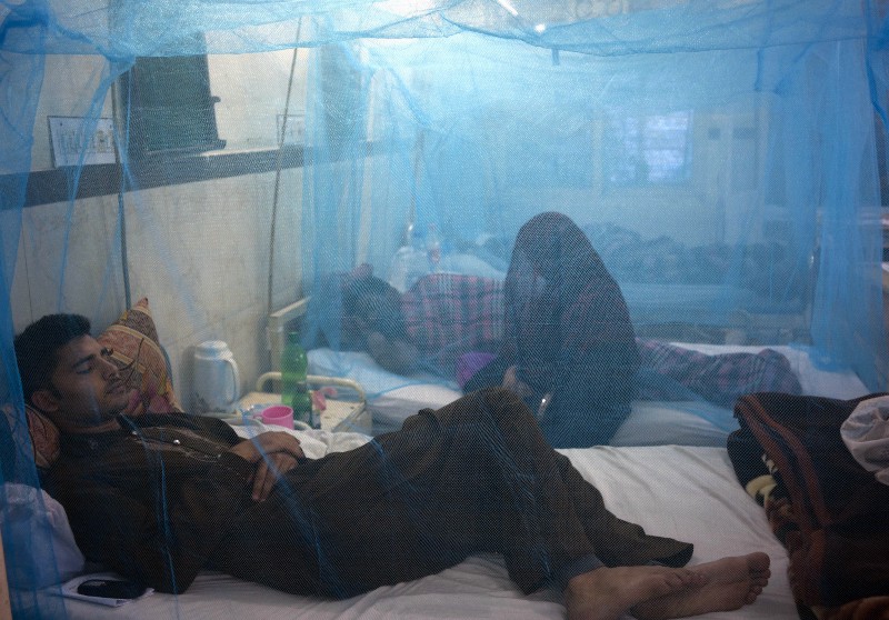 Pakistani patients suffering from dengue fever rest in an isolation ward at a local hospital in Rawalpindi, Pakistan, Tuesday, Oct 21, 2014. CREDIT: AP PHOTO/B.K. BANGASH