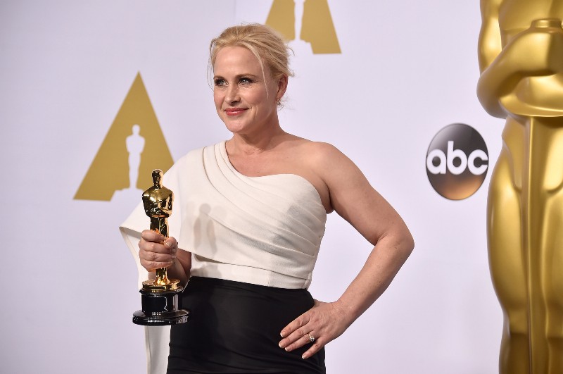 Patricia Arquette poses in the press room with the award for best actress in a supporting role CREDIT: JORDAN STRAUSS/INVISION/AP