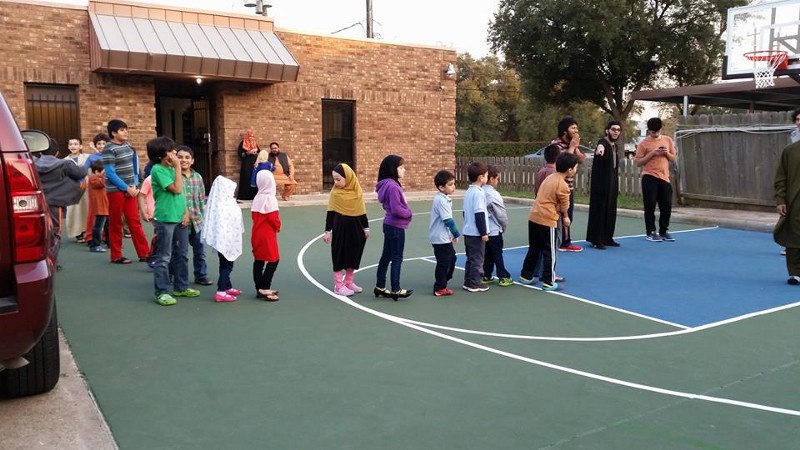 Kids playing on the basketball court at the Quba Islamic Institute just a day before. CREDIT: QUBA ISLAMIC INSTITUTE