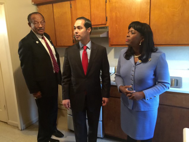Selma’s Mayor (left) and Congresswoman (right) give Housing Secretary Julian Castro (center) a tour of the town’s aging public housing projects. CREDIT: Deshundra Jefferson
