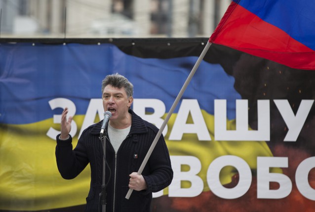 Boris Nemtsov addresses demonstrators during a massive rally to oppose president Vladimir Putin’s policies in Ukraine in March 2014. CREDIT: AP