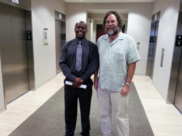 Sylvester Owino with his lawyer James Fife CREDIT: James Fife