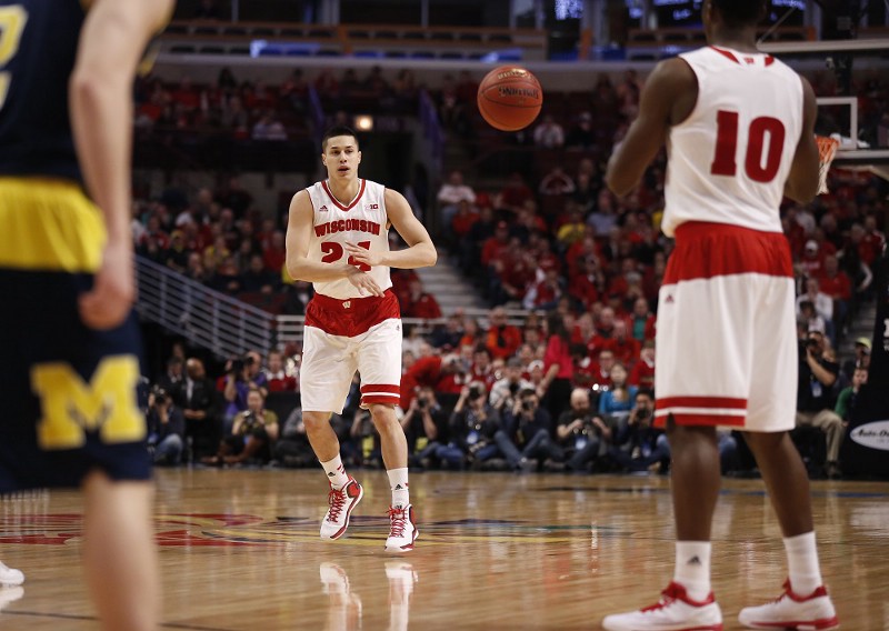 Wisconsin’s Bronson Koenig (24) passes to Nigel Hayes (10) during the Big Ten tournament. CREDIT: (AP PHOTO/KIICHIRO SATO)