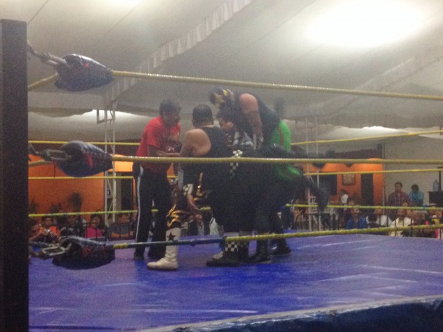 Checo helps the luchadores form a human pyramid. Why not? CREDIT: Scott Keyes