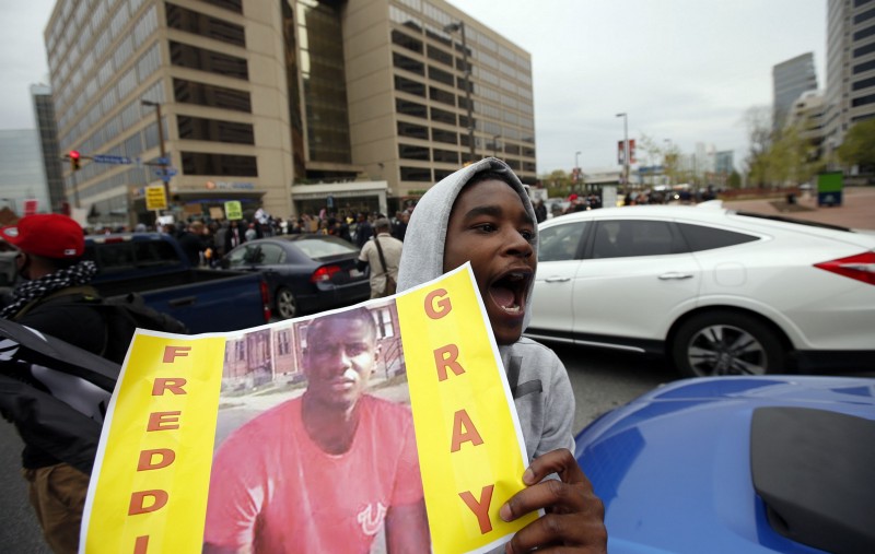 Protests in Baltimore on Saturday, April 25. CREDIT: AP PHOTO/ALEX BRANDON
