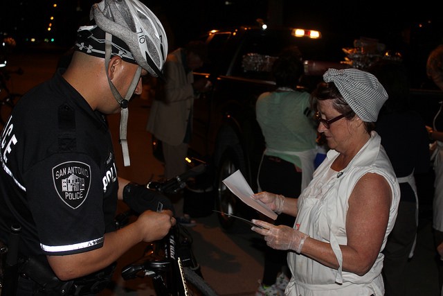 Joan Cheever being ticketed by San Antonio police CREDIT: FLICKR/DAVID DAVIES