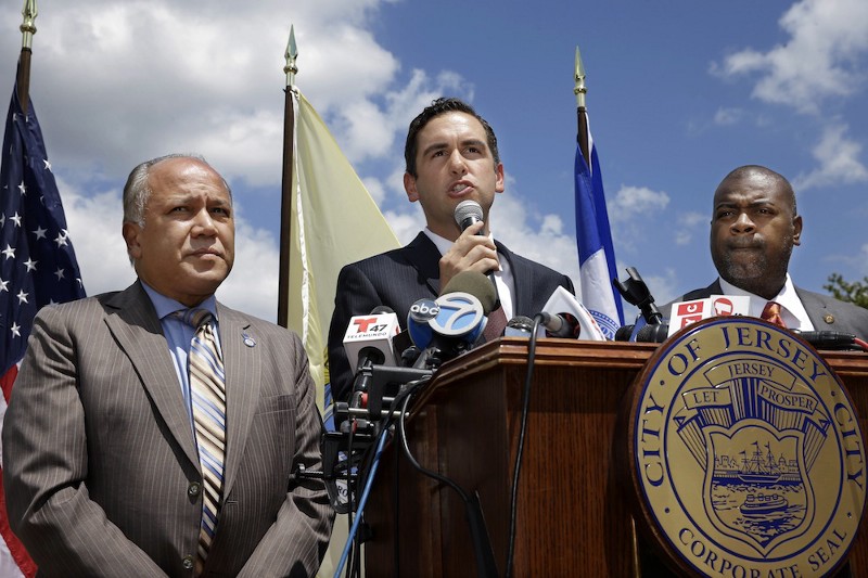 Jersey City Mayor Steven Fulop (center) CREDIT: AP/MEL EVANS