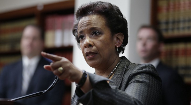 Attorney General Loretta Lynch announced felony plea deals and multi-billion-dollar fines for a cartel of bankers on Wednesday, but the penalties and pleas are less than meets the eye. CREDIT: AP PHOTO/SETH WENIG