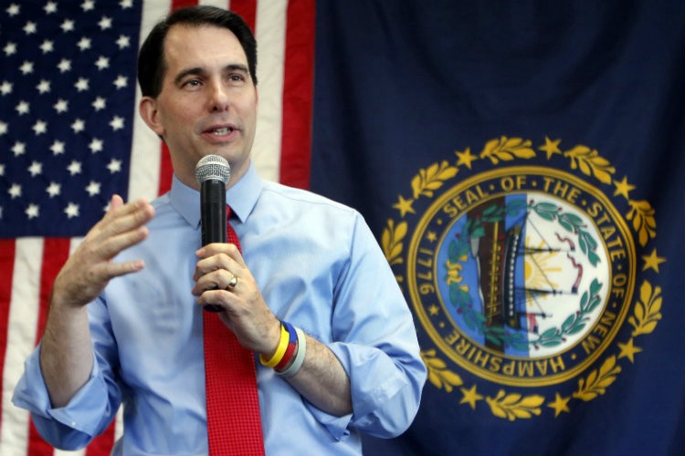Wisconsin Gov. Scott Walker (R) campaigning in New Hampshire, a marriage equality state. CREDIT: AP PHOTO/JIM COLE