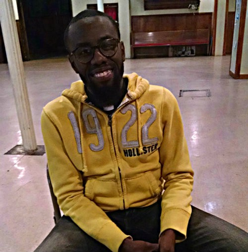 Rev. Parker talks to ThinkProgress about Freddie Gray’s community at Ames United Methodist Church. Photo by Erica Hellerstein.