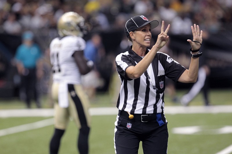 Sarah Thomas during an NFL preseason game between New Orleans and Oakland in 2013. CREDIT: (AP PHOTO/MATTHEW HINTON)