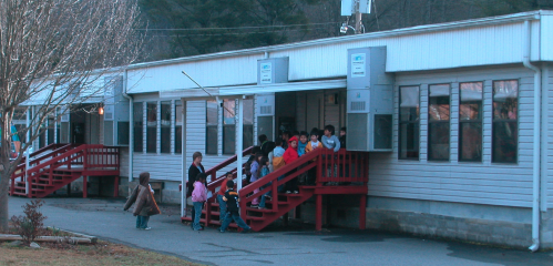 Students stand outside a BIE school. CREDIT: Bureau of Indian Affairs