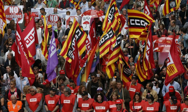 People protest during a May Day rally in the center of Barcelona, Spain, Friday, May 1, 2015. CREDIT: AP