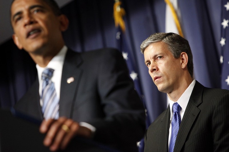 Education Secretary Arne Duncan with President Obama CREDIT: AP PHOTO/HARAZ N. GHANBARI