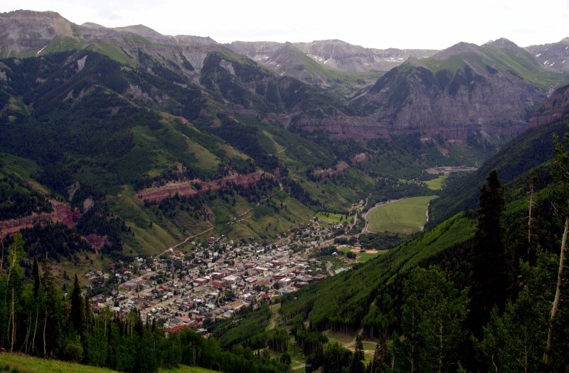 The old mining town of Telluride, Colo., is pictured nestled in a valley from the top of Mount St. Sophia, in this July 17, 2001, file photo. CREDIT: AP PHOTO/ED ANDRIESKI