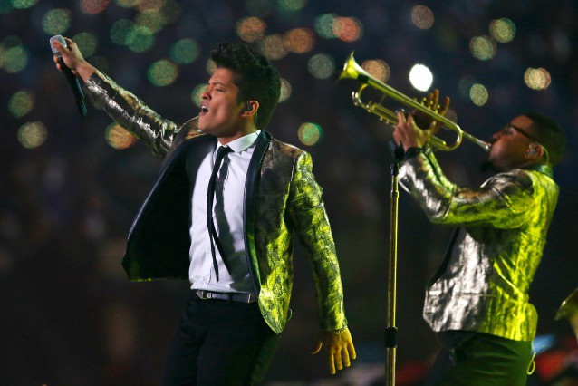 Bruno Mars performs during the halftime show of the NFL Super Bowl XLVIII. CREDIT: AP PHOTO/PAUL SANCYA