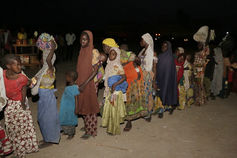 Women and children rescued by Nigeria soldiers from Boko Haram extremists at Sambisa forest arrive at a refugee camp in Yola, Nigeria Saturday, May. 2, 2015. CREDIT: AP