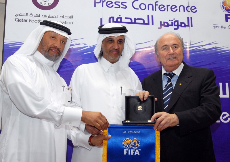 FIFA head Sepp Blatter with key officials from Qatar’s successful bid to host the 2022 World Cup CREDIT: AP