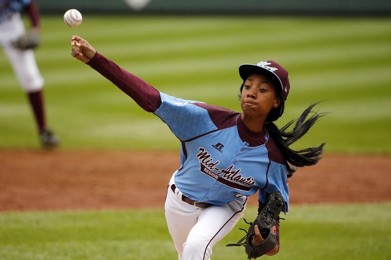 Mo’ne Davis pitching at last year’s Little League World Series. CREDIT: (AP PHOTO/GENE J. PUSKAR)