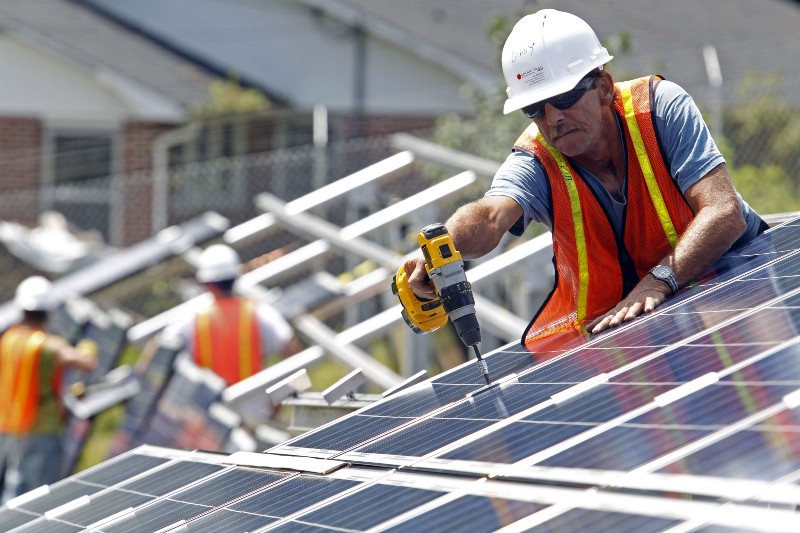 North Carolina’s booming utility-scale solar development has been bolstered by the state’s tax incentive, which was extended Thursday. CREDIT: AP PHOTO/BOB LEVERONE